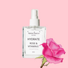 Tania Louise Hydrate spray. Rose and Vitamin E. Pink Rose. Glass bottle